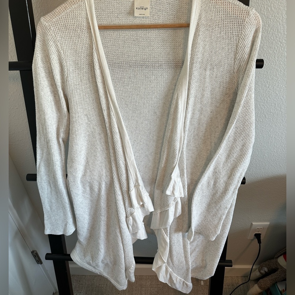 Cream cover up/shawl type sweater.